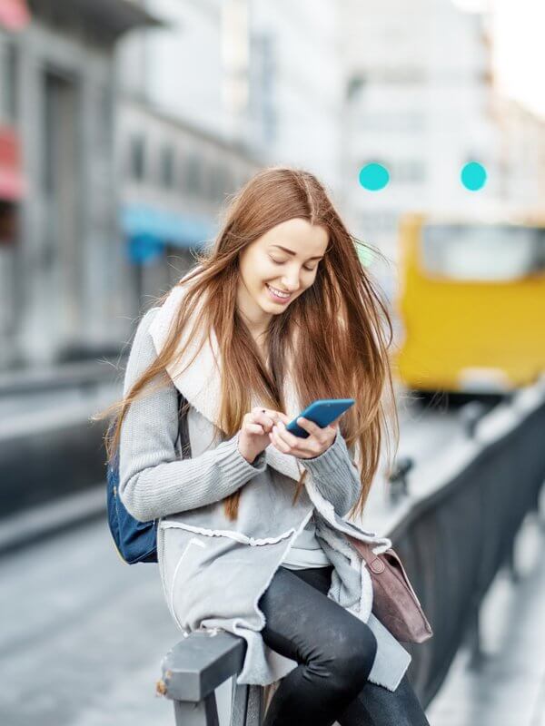 Woman waiting for public transport