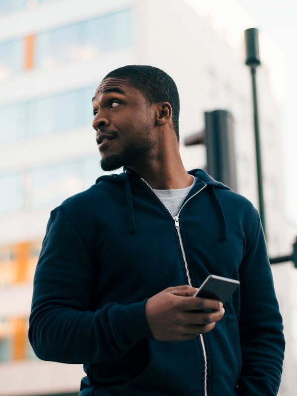 Man using social media on his smartphone