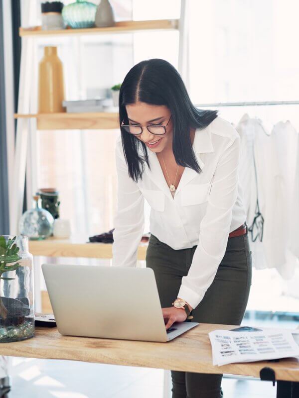 Business owner looking at her customer data